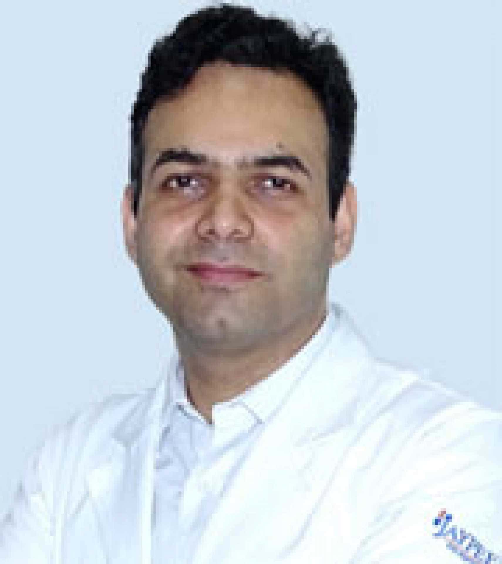 Dr Dinesh Rattnani, [object Object]